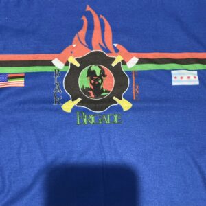 A blue shirt with a fire and flames on it.